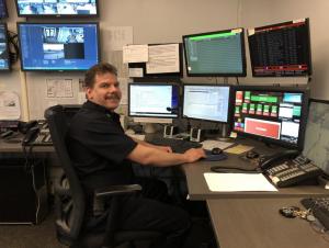 University Police Dispatcher at call station