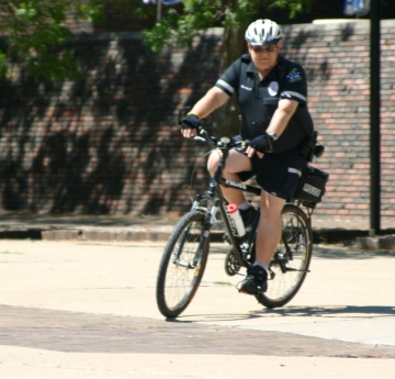 Image of UPD Bike Patrol Officer riding his bike