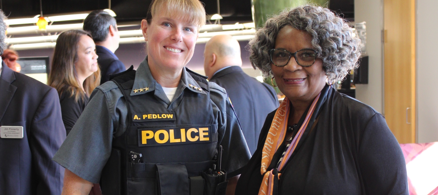 Image of chief of police with interim university president